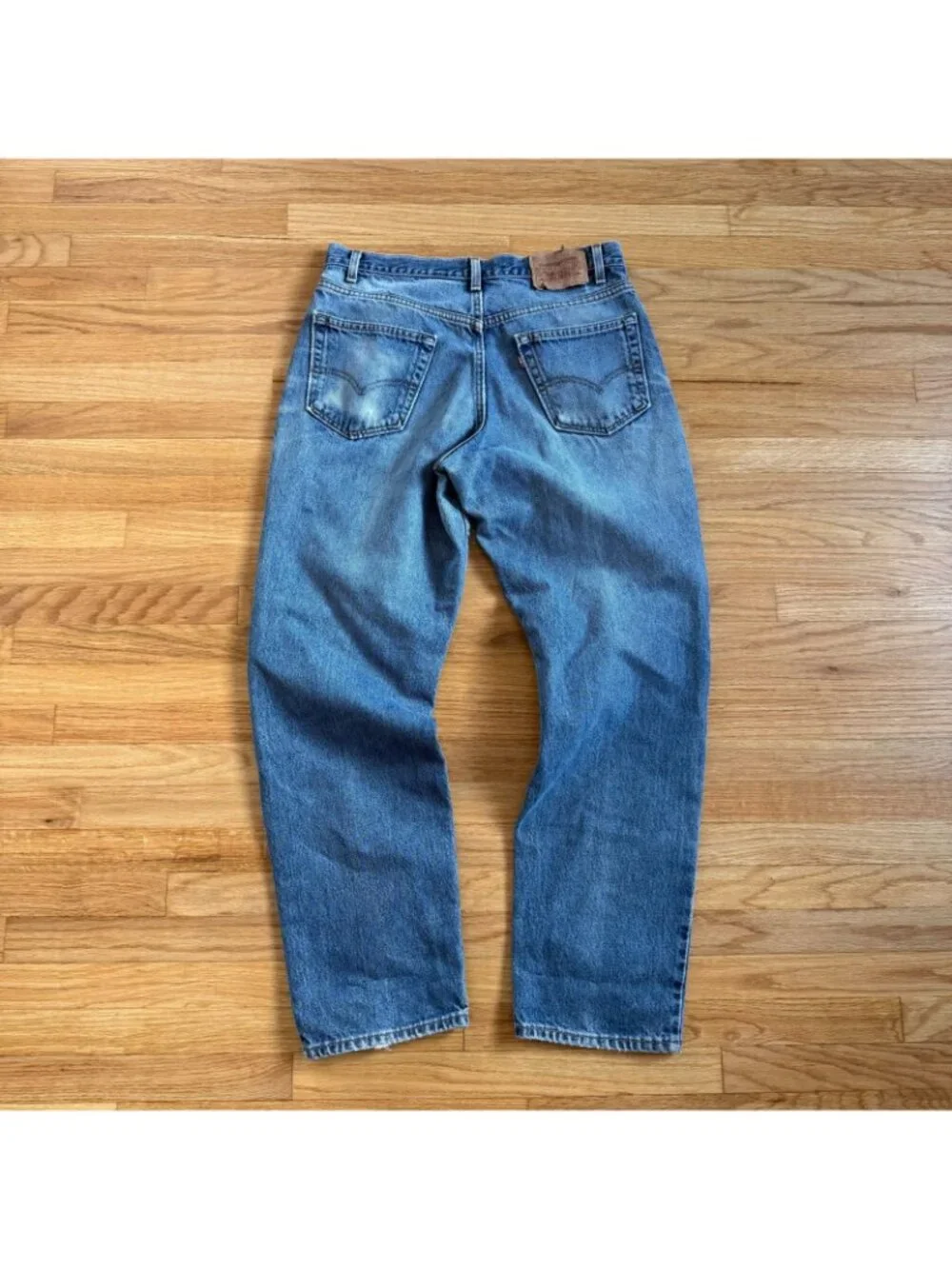 Levi's Vintage 90's 550 MiUSA s Destroyed & Repaired Light Wash Jeans 34/32